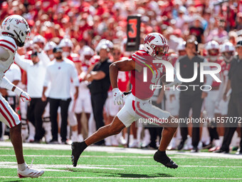 Wisconsin Badgers wide receiver Bryson Green #9 outruns the defense of the South Dakota Coyotes at Camp Randall Stadium in Madison, Wisconsi...