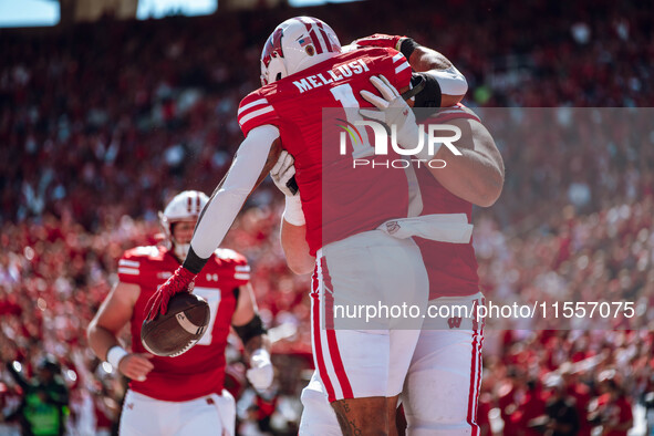 Wisconsin Badgers running back Chez Mellusi #1 celebrates a touchdown against the South Dakota Coyotes at Camp Randall Stadium in Madison, W...