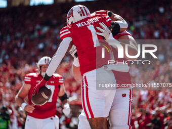 Wisconsin Badgers running back Chez Mellusi #1 celebrates a touchdown against the South Dakota Coyotes at Camp Randall Stadium in Madison, W...