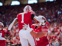 Wisconsin Badgers running back Chez Mellusi #1 celebrates a touchdown against the South Dakota Coyotes at Camp Randall Stadium in Madison, W...