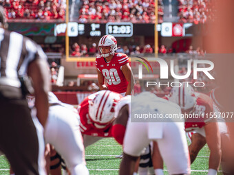 Wisconsin Badgers kicker Nathanial Vakos #90 lines up an extra point at Camp Randall Stadium in Madison, Wisconsin, on September 7, 2024. (