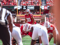 Wisconsin Badgers kicker Nathanial Vakos #90 lines up an extra point at Camp Randall Stadium in Madison, Wisconsin, on September 7, 2024. (