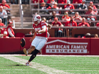 Wisconsin Badgers kicker Gavin Lahm #97 kicks off against the South Dakota Coyotes at Camp Randall Stadium in Madison, Wisconsin, on Septemb...