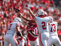 South Dakota quarterback Aidan Bouman #2 attempts to pass at Camp Randall Stadium in Madison, Wisconsin, on September 7, 2024. (