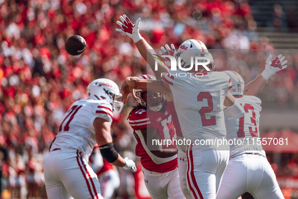 South Dakota quarterback Aidan Bouman #2 attempts to pass at Camp Randall Stadium in Madison, Wisconsin, on September 7, 2024. 