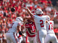 South Dakota quarterback Aidan Bouman #2 attempts to pass at Camp Randall Stadium in Madison, Wisconsin, on September 7, 2024. (