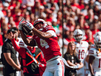 Wisconsin Badgers wide receiver C.J. Williams #4 catches a pass against the South Dakota Coyotes at Camp Randall Stadium in Madison, Wiscons...