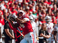 Wisconsin Badgers wide receiver C.J. Williams #4 catches a pass against the South Dakota Coyotes at Camp Randall Stadium in Madison, Wiscons...