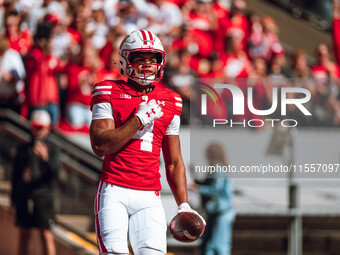 Wisconsin Badgers wide receiver C.J. Williams #4 celebrates a touchdown against the South Dakota Coyotes at Camp Randall Stadium in Madison,...