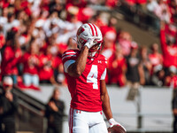 Wisconsin Badgers wide receiver C.J. Williams #4 celebrates a touchdown against the South Dakota Coyotes at Camp Randall Stadium in Madison,...