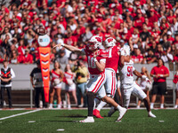 Wisconsin Badgers quarterback Tyler Van Dyke #10 attempts a pass against the South Dakota Coyotes at Camp Randall Stadium in Madison, Wiscon...