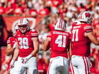 Wisconsin Badgers tight end Tucker Ashcraft #38, tight end JT Seagreaves #41, and offensive lineman Riley Mahlman #71 are at Camp Randall St...