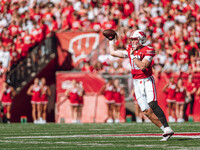 Wisconsin Badgers quarterback Tyler Van Dyke #10 attempts a pass against the South Dakota Coyotes at Camp Randall Stadium in Madison, Wiscon...