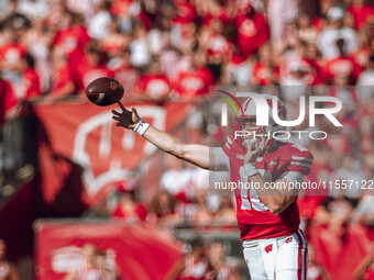 Wisconsin Badgers quarterback Tyler Van Dyke #10 attempts a pass against the South Dakota Coyotes at Camp Randall Stadium in Madison, Wiscon...