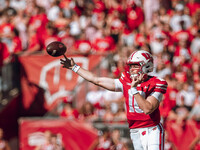 Wisconsin Badgers quarterback Tyler Van Dyke #10 attempts a pass against the South Dakota Coyotes at Camp Randall Stadium in Madison, Wiscon...