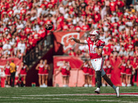 Wisconsin Badgers quarterback Tyler Van Dyke #10 attempts a pass against the South Dakota Coyotes at Camp Randall Stadium in Madison, Wiscon...