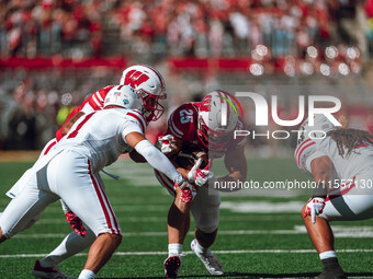 Wisconsin Badgers running back Cade Yacamelli #25 finds a hole against the South Dakota Coyotes at Camp Randall Stadium in Madison, Wisconsi...