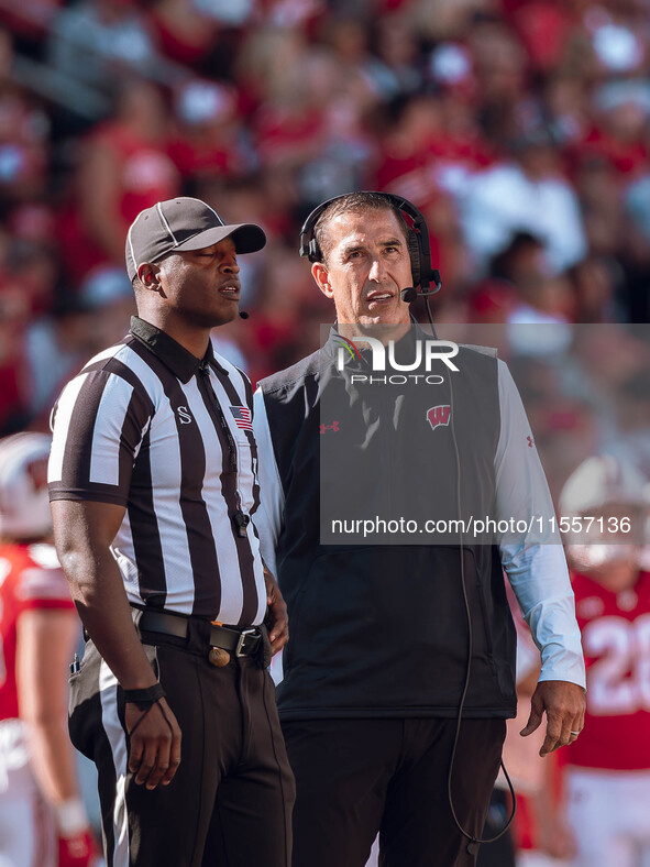 Wisconsin Badgers Head Coach Luke Fickell reviews a play on the board at Camp Randall Stadium in Madison, Wisconsin, on September 7, 2024. 