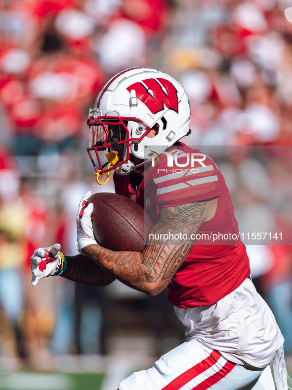 Wisconsin Badgers wide receiver Trech Kekahuna #2 returns a kickoff against the South Dakota Coyotes at Camp Randall Stadium in Madison, Wis...