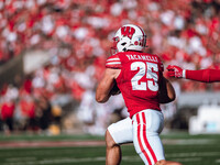 Wisconsin Badgers running back Cade Yacamelli #25 runs through the South Dakota Coyotes defense at Camp Randall Stadium in Madison, Wisconsi...