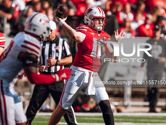 Wisconsin Badgers quarterback Tyler Van Dyke #10 throws a pass against the South Dakota Coyotes at Camp Randall Stadium in Madison, Wisconsi...