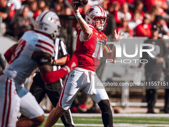 Wisconsin Badgers quarterback Tyler Van Dyke #10 throws a pass against the South Dakota Coyotes at Camp Randall Stadium in Madison, Wisconsi...