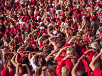 Fans look at the scoreboard in disbelief at Camp Randall Stadium in Madison, Wisconsin, on September 7, 2024. (