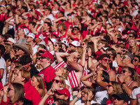 Fans look at the scoreboard in disbelief at Camp Randall Stadium in Madison, Wisconsin, on September 7, 2024. (