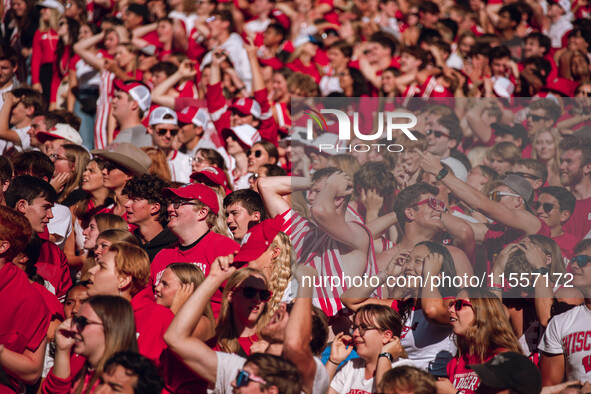 Fans look at the scoreboard in disbelief at Camp Randall Stadium in Madison, Wisconsin, on September 7, 2024. 