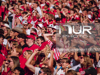 Fans look at the scoreboard in disbelief at Camp Randall Stadium in Madison, Wisconsin, on September 7, 2024. (