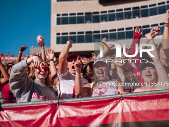 Wisconsin Badger fans celebrate at Camp Randall Stadium in Madison, Wisconsin, on September 7, 2024. (