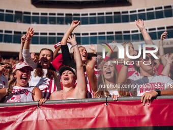 Wisconsin Badger fans celebrate at Camp Randall Stadium in Madison, Wisconsin, on September 7, 2024. (