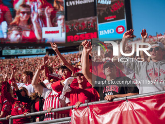 Wisconsin Badger fans celebrate at Camp Randall Stadium in Madison, Wisconsin, on September 7, 2024. (