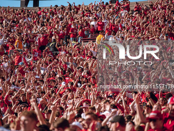 Wisconsin Badger fans celebrate at Camp Randall Stadium in Madison, Wisconsin, on September 7, 2024. (