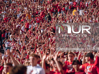 Wisconsin Badger fans celebrate at Camp Randall Stadium in Madison, Wisconsin, on September 7, 2024. (