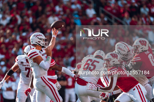 South Dakota quarterback Aidan Bouman #2 attempts a pass against the Wisconsin Badgers at Camp Randall Stadium in Madison, Wisconsin, on Sep...