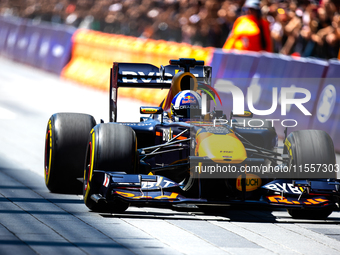 David Coulthard drives an RB8 through downtown Houston, Texas, on September 7, 2024. (