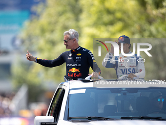 David Coulthard and Arvid Lindblad ride through downtown Houston, Texas, on September 7, 2024, and wave to fans ahead of Red Bull's Showrun....