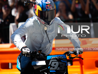 Aaron Colton rides through downtown Houston, Texas, on September 7, 2024, during a Red Bull Showrun. (