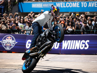 Aaron Colton performs motorcycle tricks during a Red Bull Showrun in Houston, Texas, on September 7, 2024. (