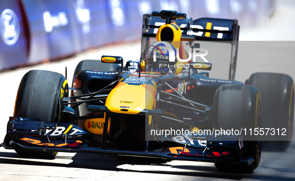 David Coulthard drives an RB8 through downtown Houston, Texas, on September 7, 2024. 