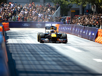 David Coulthard drives an RB8 through downtown Houston, Texas, on September 7, 2024. (