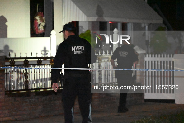 Police presence at the crime scene where three people are shot at 132-45 220th Street in Jamaica, Queens, New York, United States, on Septem...