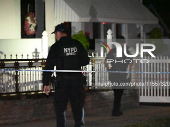 Police presence at the crime scene where three people are shot at 132-45 220th Street in Jamaica, Queens, New York, United States, on Septem...