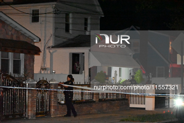 Police presence at the crime scene where three people are shot at 132-45 220th Street in Jamaica, Queens, New York, United States, on Septem...