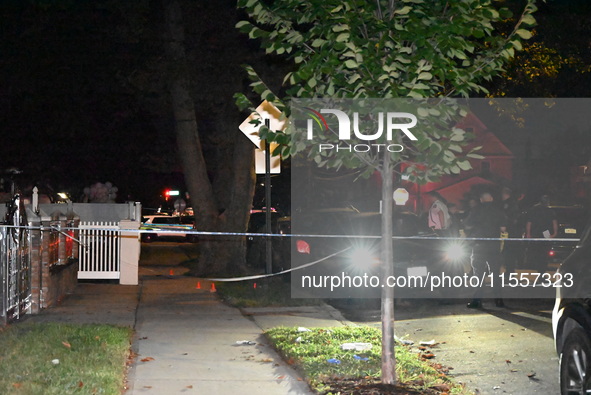 Police presence at the crime scene where three people are shot at 132-45 220th Street in Jamaica, Queens, New York, United States, on Septem...