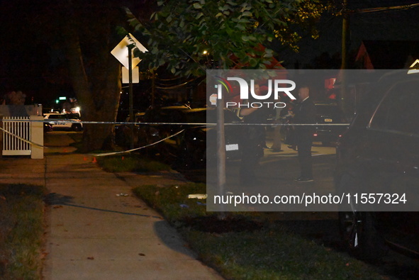 Police presence at the crime scene where three people are shot at 132-45 220th Street in Jamaica, Queens, New York, United States, on Septem...