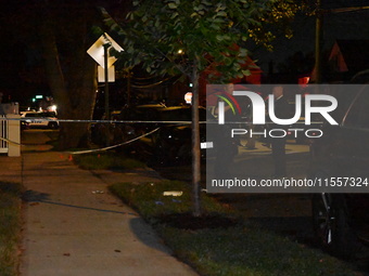 Police presence at the crime scene where three people are shot at 132-45 220th Street in Jamaica, Queens, New York, United States, on Septem...