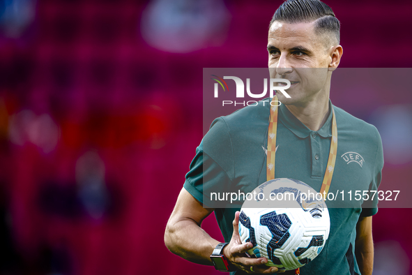 Referee Donatas Rumsas officiates the match between the Netherlands and Bosnia and Herzegovina at the Philips Stadium for the UEFA Nations L...