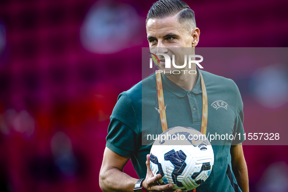 Referee Donatas Rumsas officiates the match between the Netherlands and Bosnia and Herzegovina at the Philips Stadium for the UEFA Nations L...